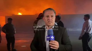 כתב איראני באזור הפיצוץ באיראן. ...