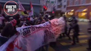 עימותים בין כוחות משטרה למפגינים פרו פלסטינים בבזל, בזמן גמר...