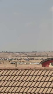 ירי במהלך הלוויה, ושני בני אדם נפצעו, במהלך קבורתה של אישה...