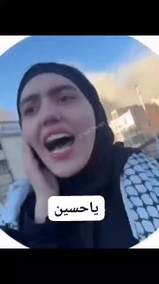 טהראן: אישה שיעית תומכת המשטר מיללת בזמן תקיפה נגד מבנה השייך...