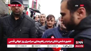 שר החינוך האיראני, עלי רזא קאזמי במהלך צעדת "יום ירושלים"...