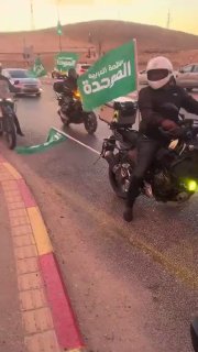 שליחי וולט שגויסו לקמפיין של רע"ם ב־7 באוקטובר, עם דגלים...